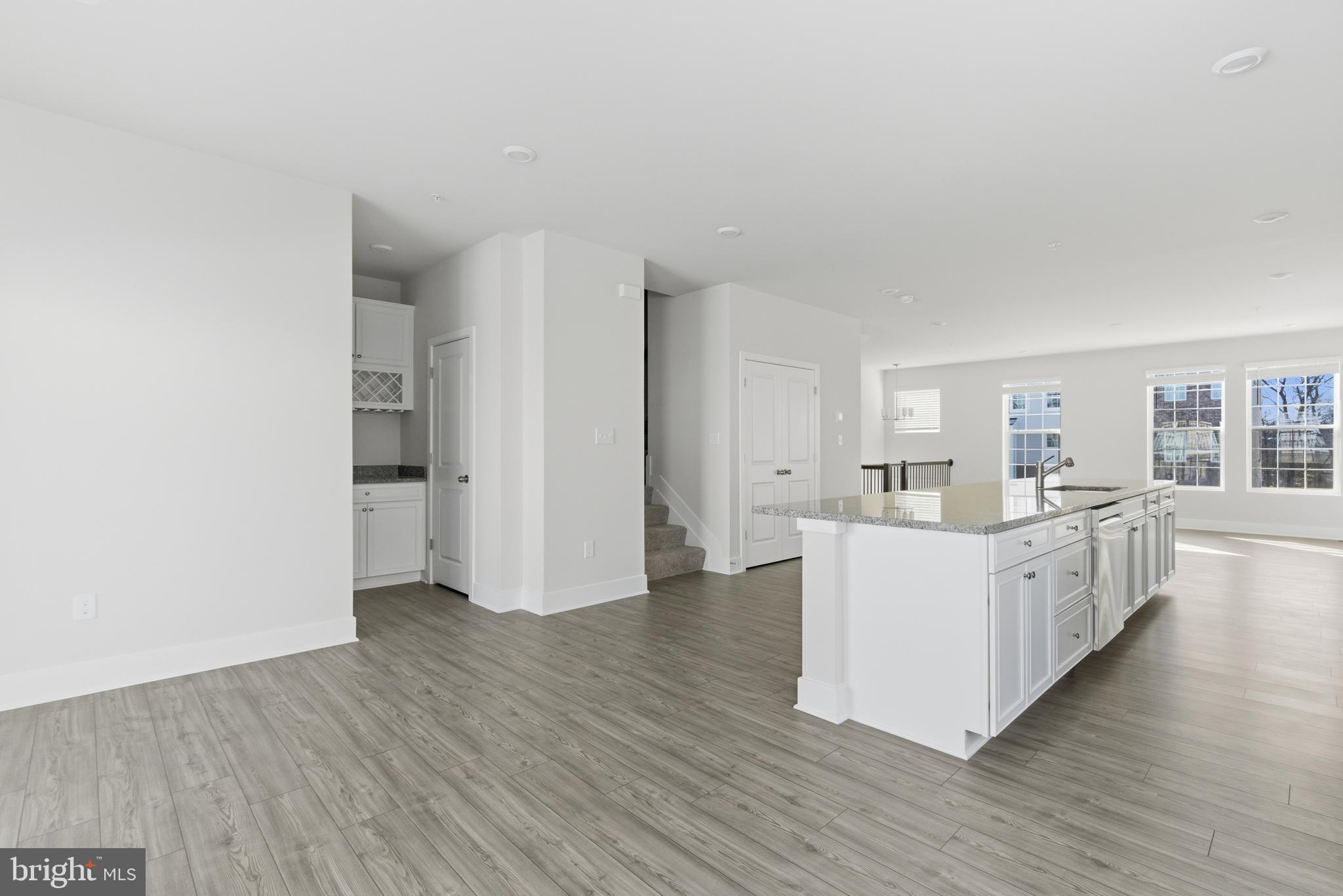 1723 Water Xing Road Pikesville, MD 21208 - Photo 14 of 37 a living room with furniture and wooden floor