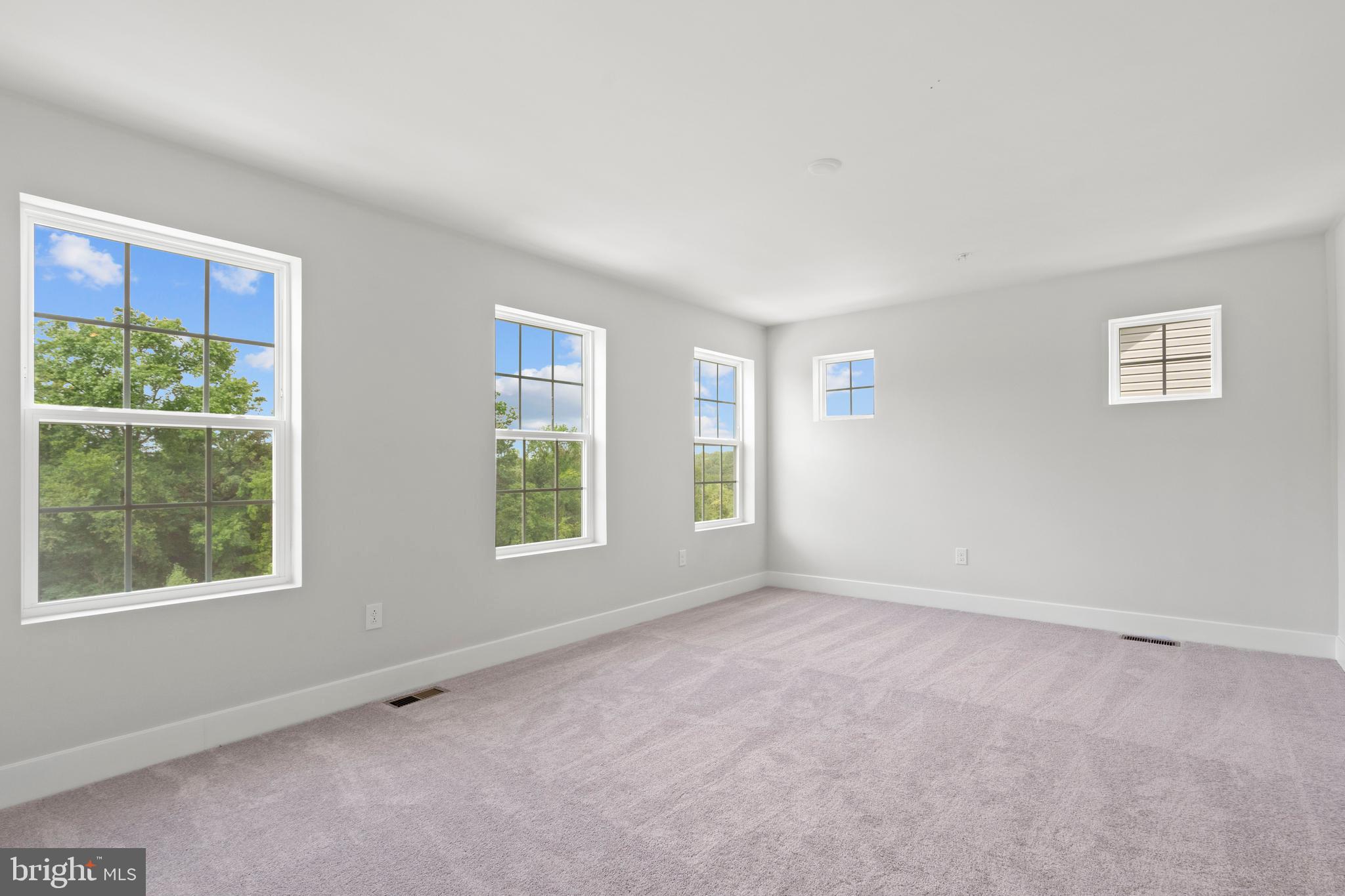 1723 Water Xing Road Pikesville, MD 21208 - Photo 16 of 32 a view of an empty room with a window