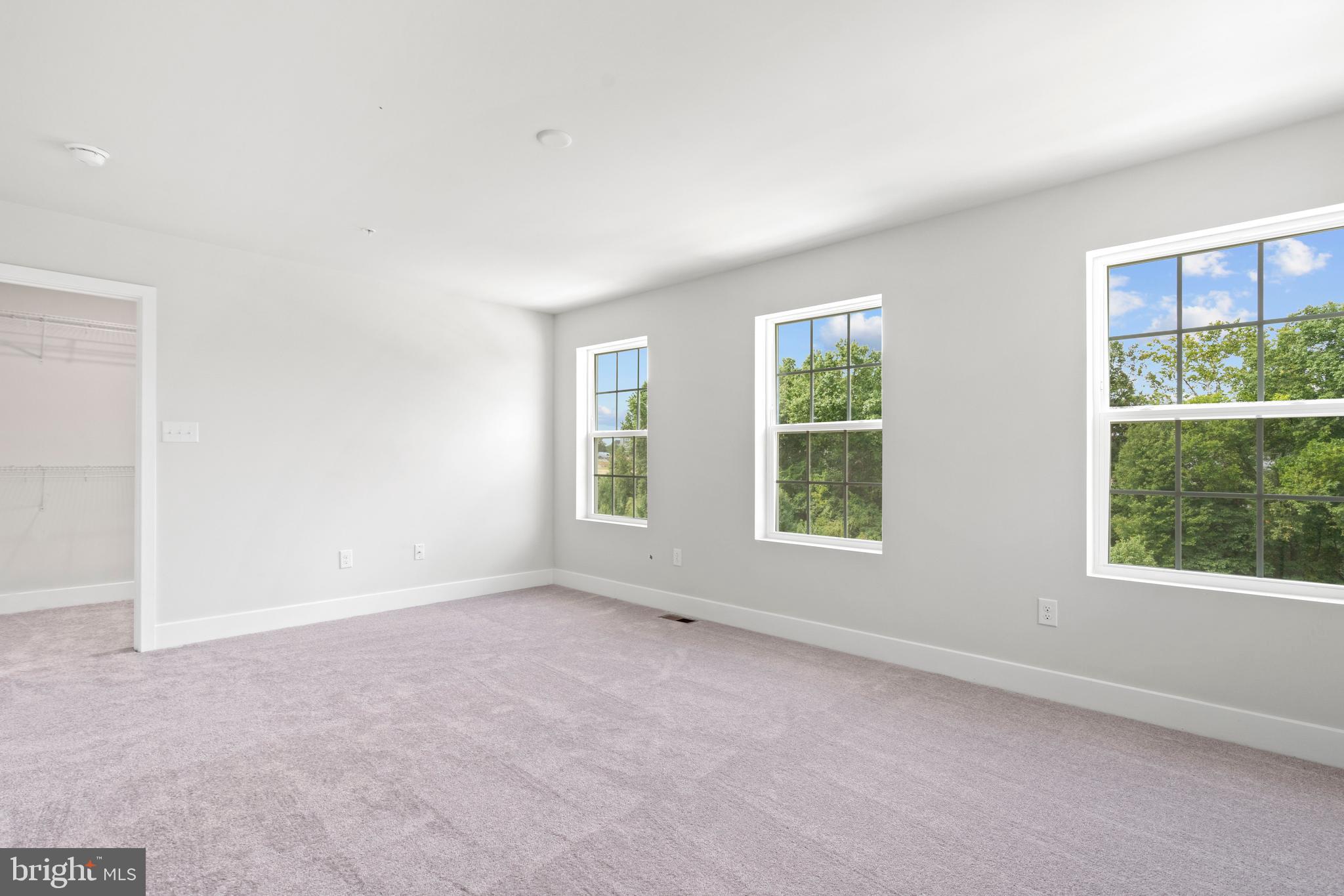 1723 Water Xing Road Pikesville, MD 21208 - Photo 17 of 32 an empty room with windows