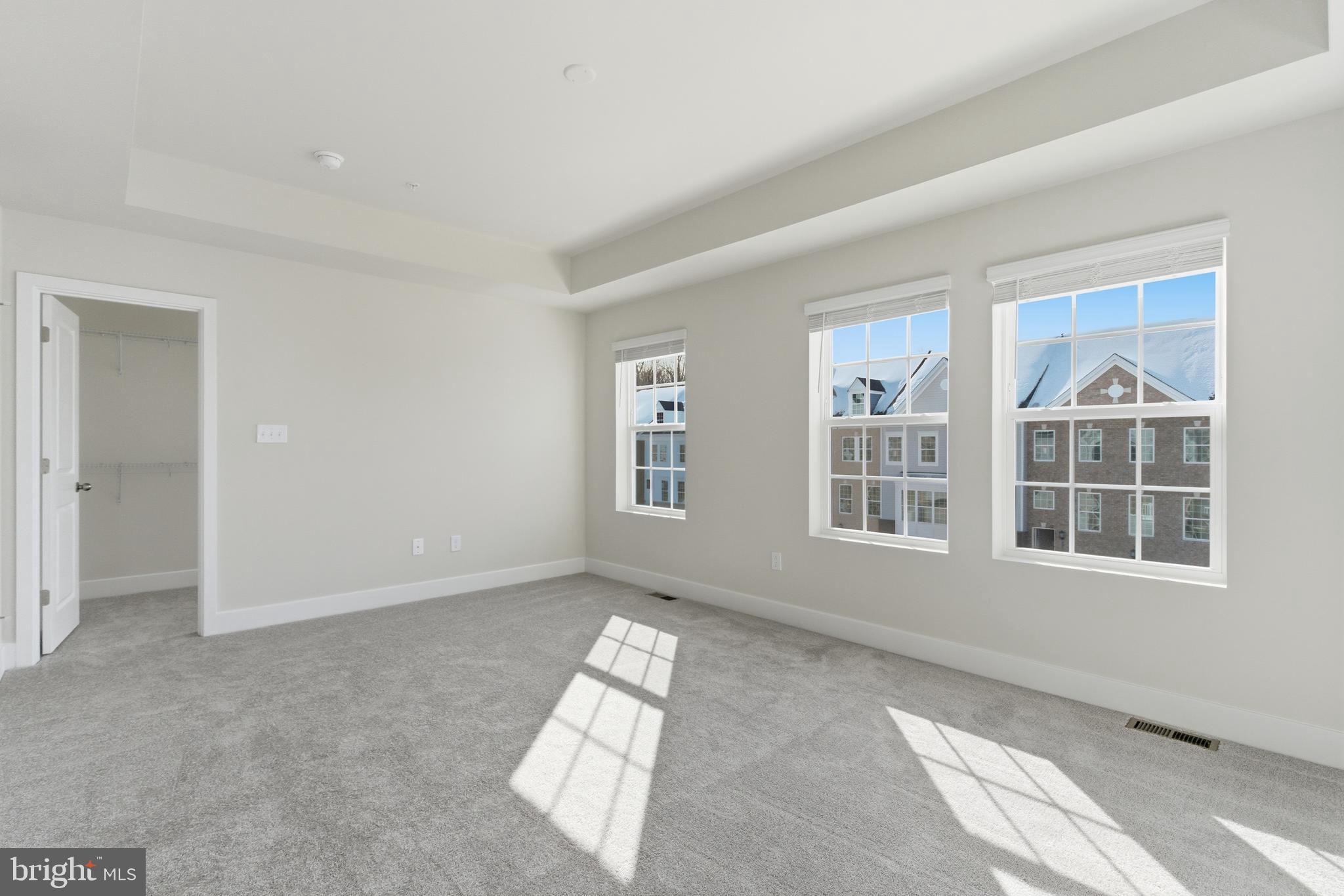 1723 Water Xing Road Pikesville, MD 21208 - Photo 20 of 37 an empty room with windows
