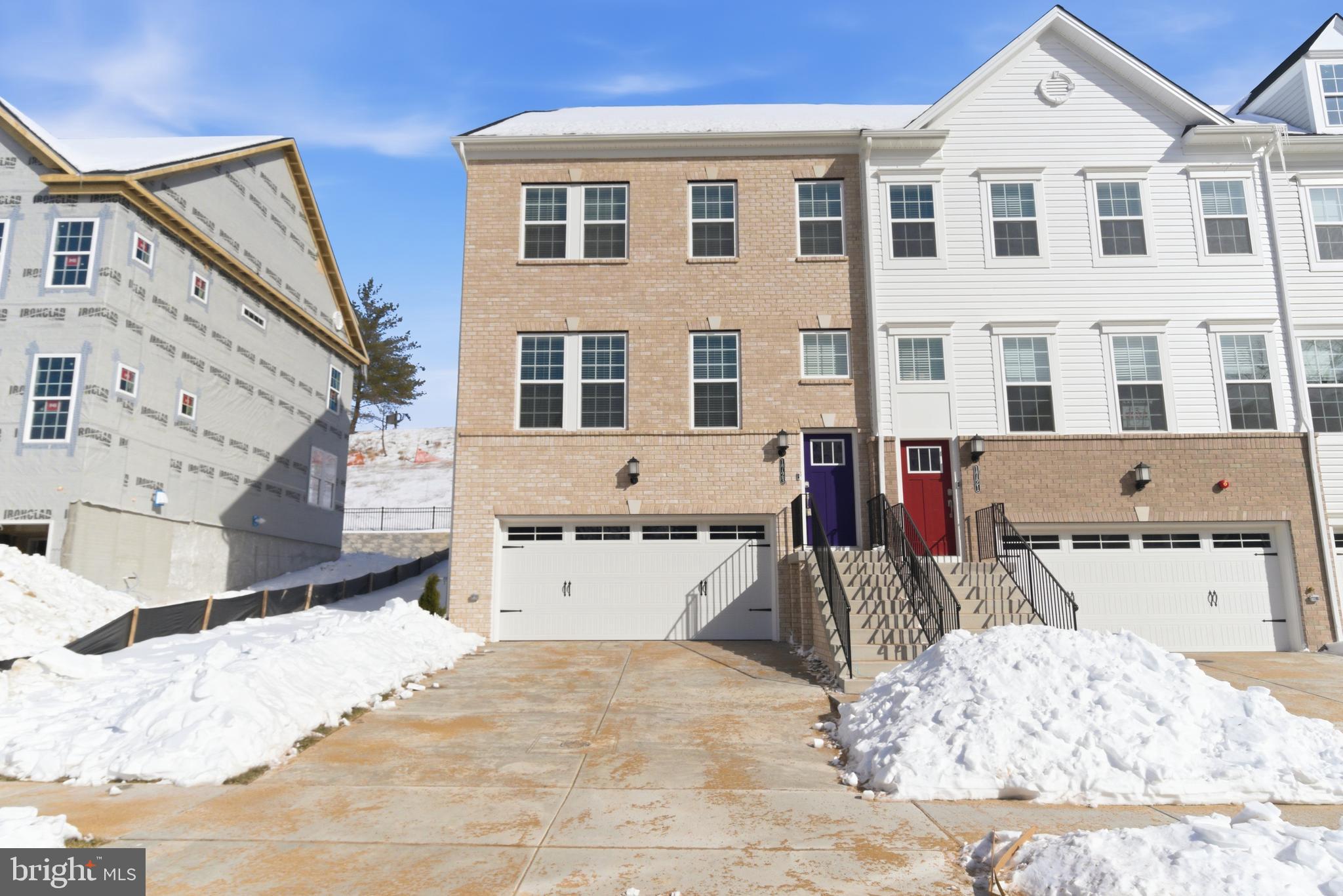 1723 Water Xing Road Pikesville, MD 21208 - Photo 2 of 37 a large white building with a outdoor space