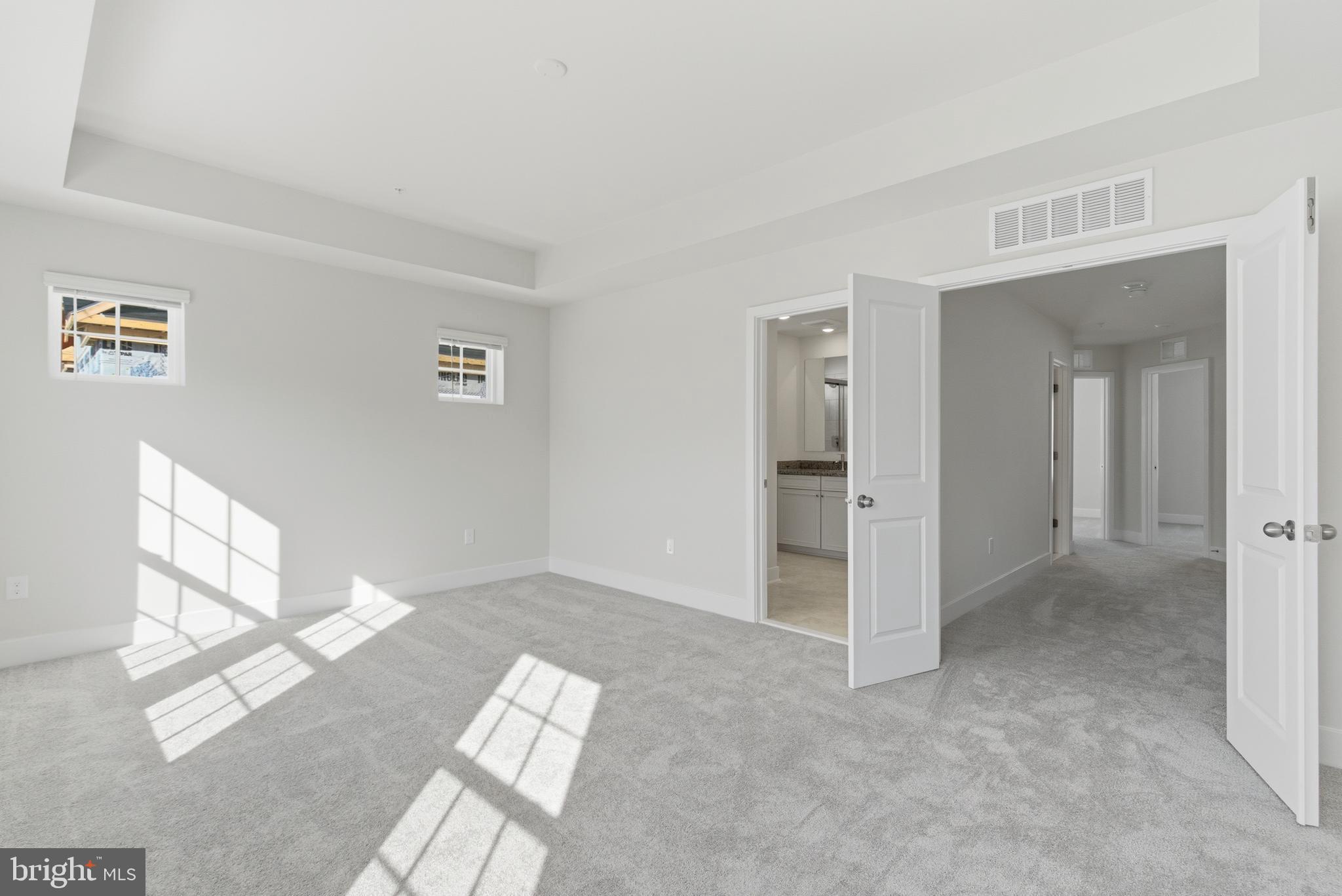1723 Water Xing Road Pikesville, MD 21208 - Photo 22 of 37 a view of an empty room and window