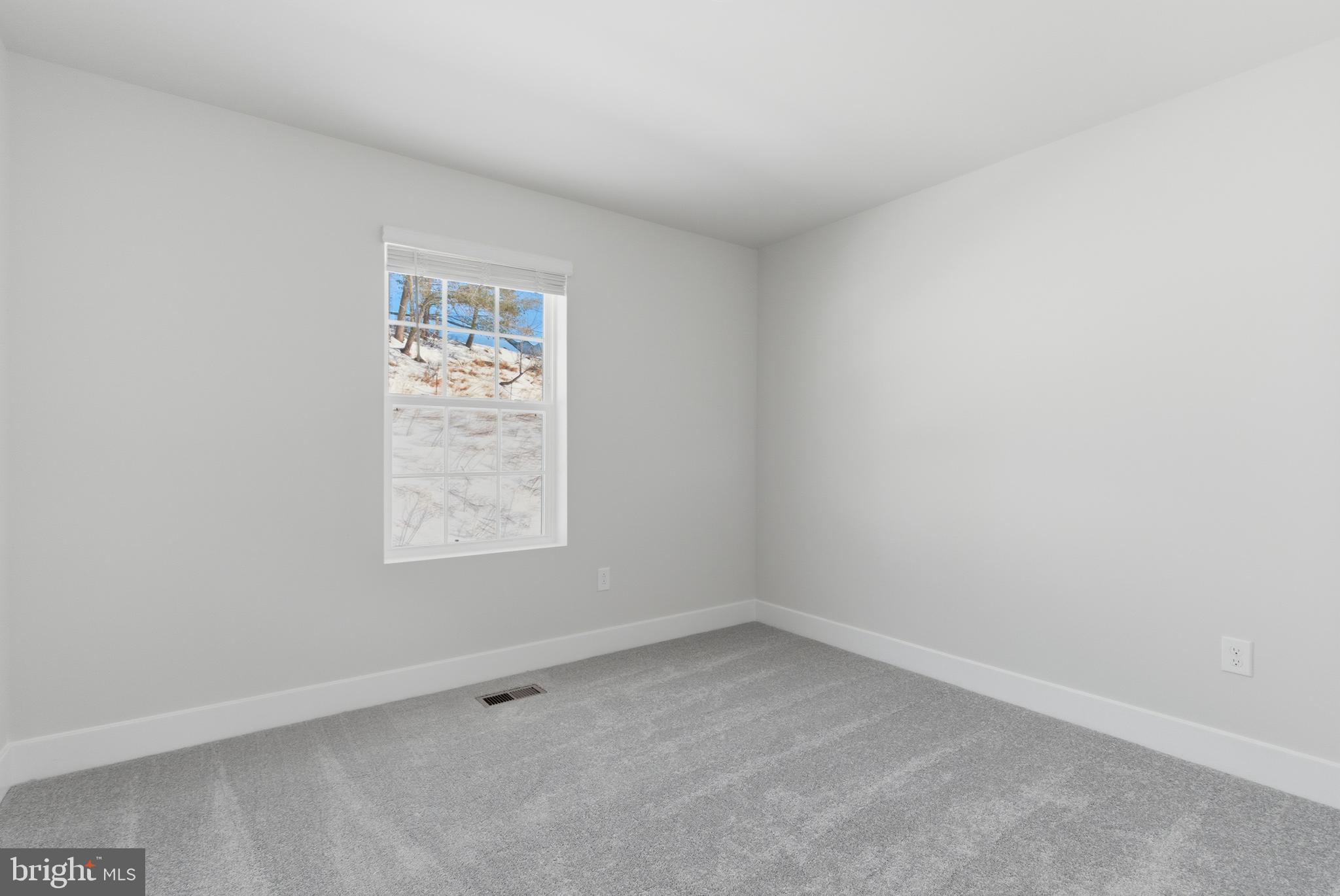 1723 Water Xing Road Pikesville, MD 21208 - Photo 25 of 37 an empty room with a window