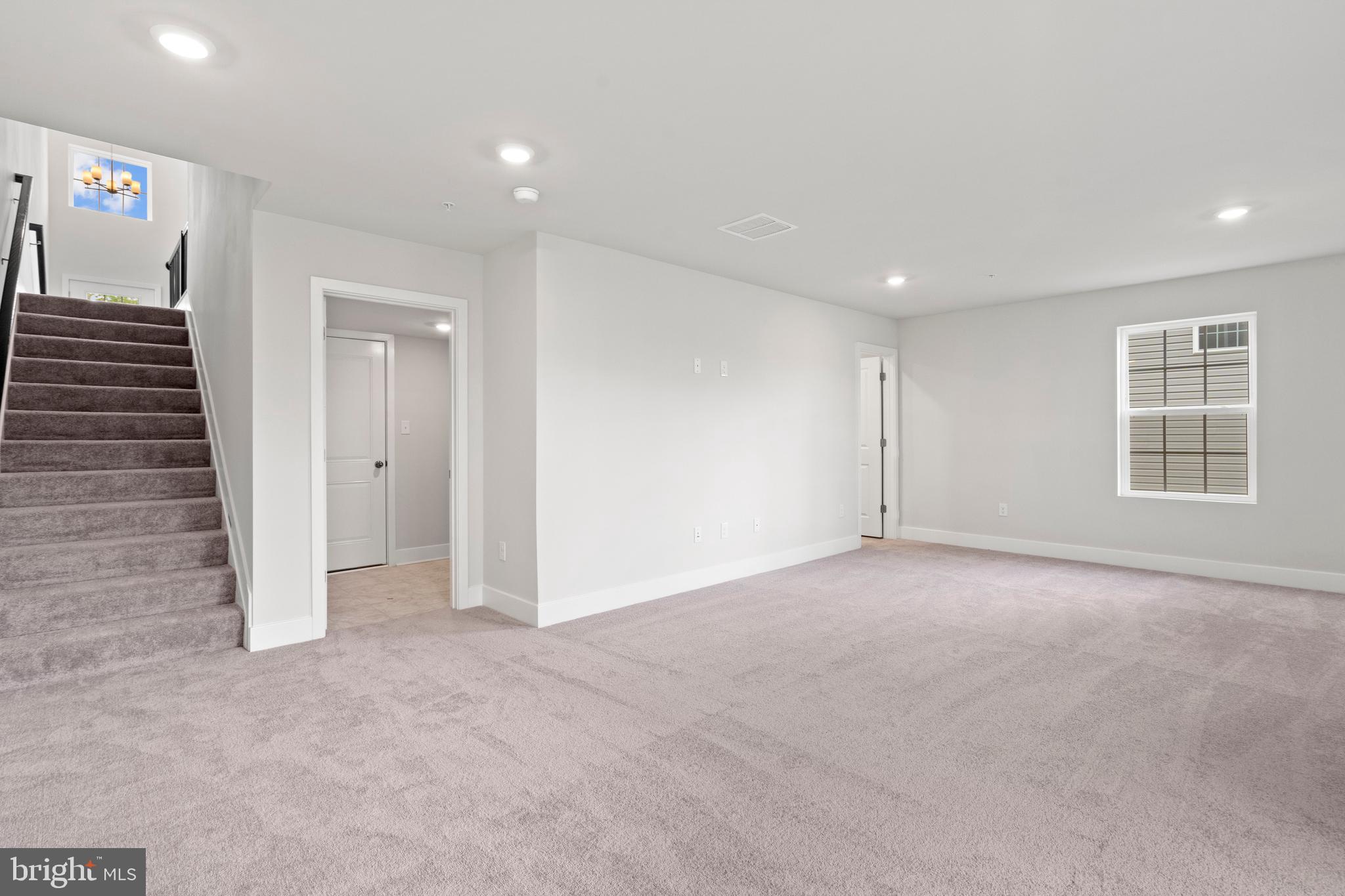 1723 Water Xing Road Pikesville, MD 21208 - Photo 29 of 32 a view of an empty room with a window