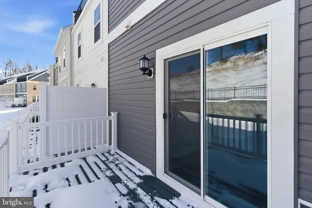 a view of a balcony with wooden floor