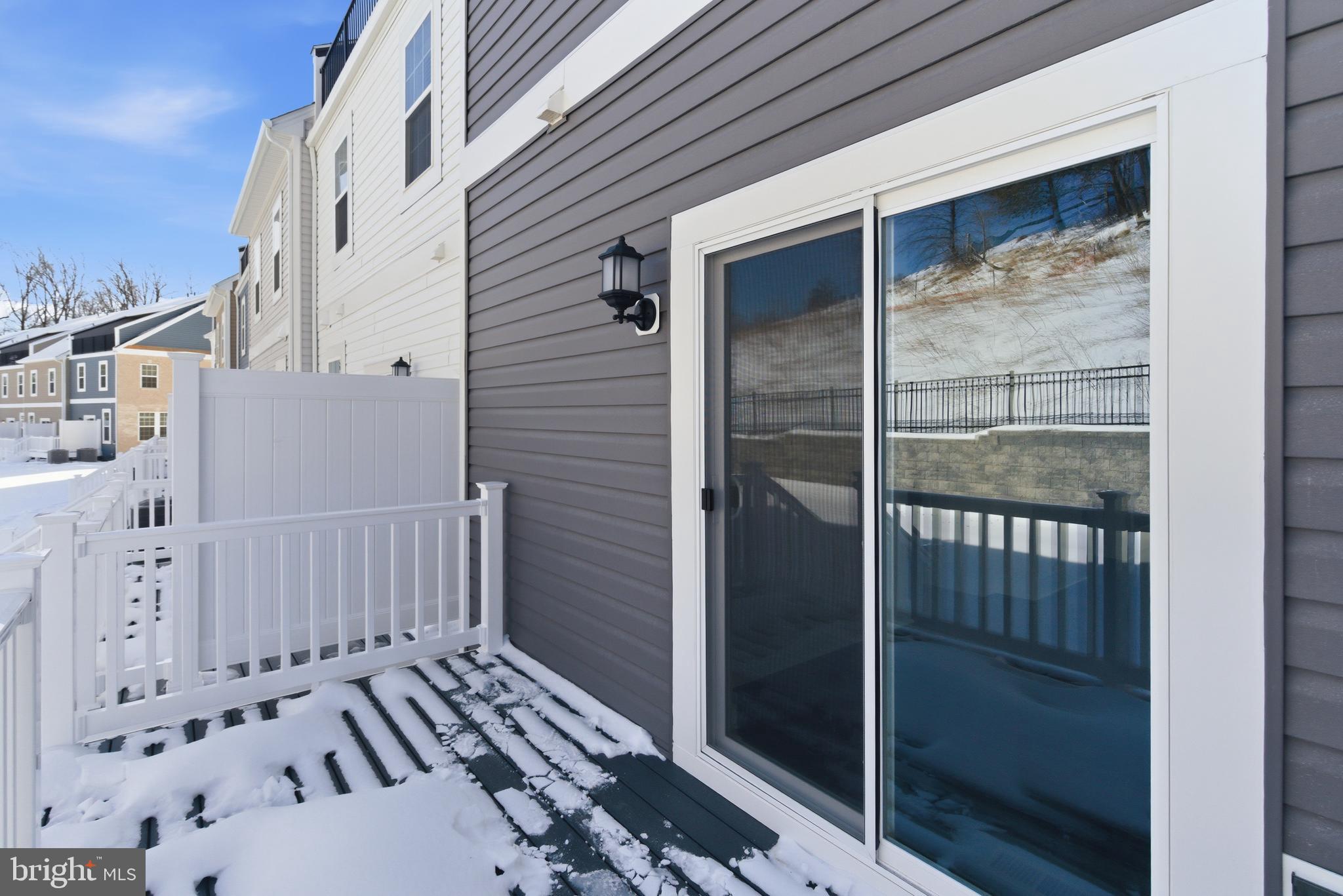 1723 Water Xing Road Pikesville, MD 21208 - Photo 36 of 37 a view of a balcony with wooden floor