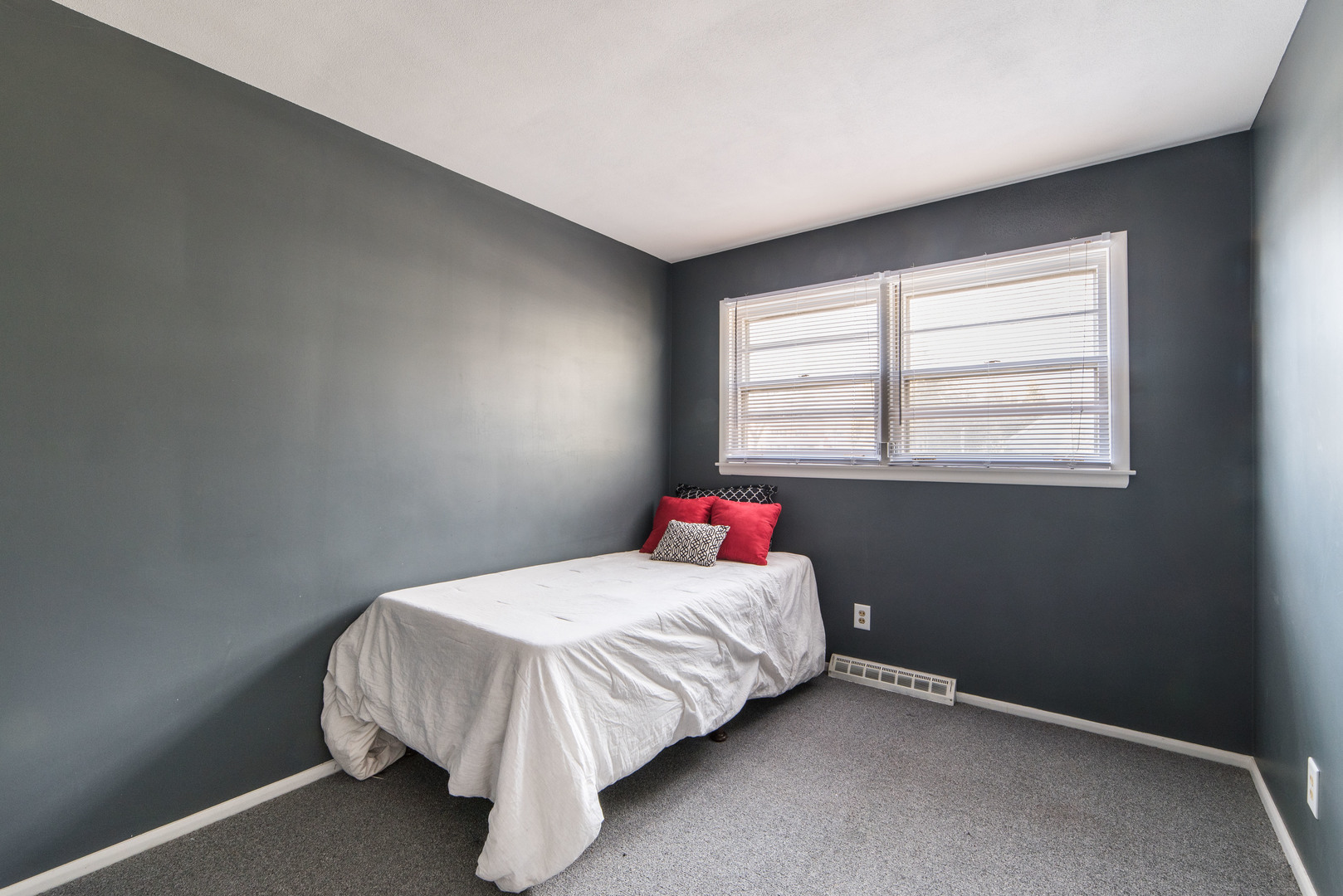 930 Normal Road DeKalb, IL 60115 - Photo 18 of 35 a bedroom with a bed and a window