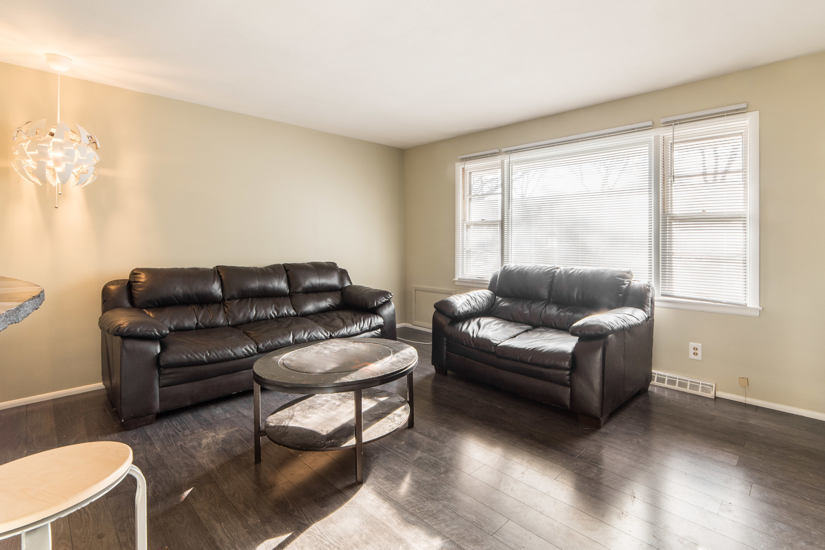 930 Normal Road DeKalb, IL 60115 - Photo 5 of 35 a living room with furniture and a window