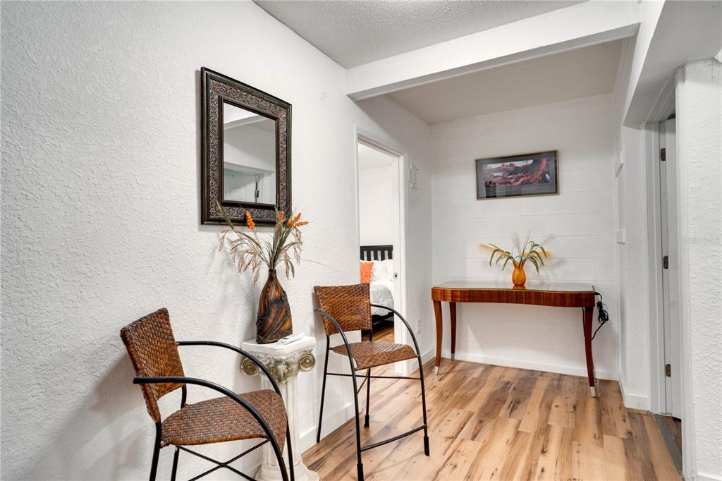 7905 Pierce Harwell Road Plant City, FL 33565 - Photo 13 of 68 a view of a livingroom with furniture and wooden floor