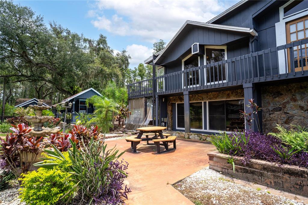 7905 Pierce Harwell Road Plant City, FL 33565 - Photo 3 of 68 a view of a house with sitting area and furniture