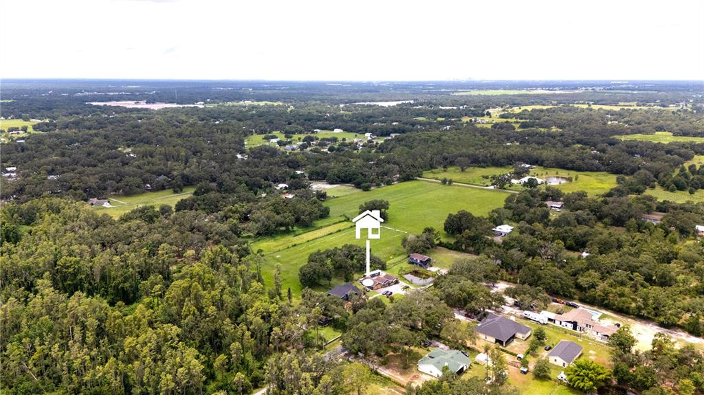 7905 Pierce Harwell Road Plant City, FL 33565 - Photo 32 of 68 a view of a city with mountains in the background