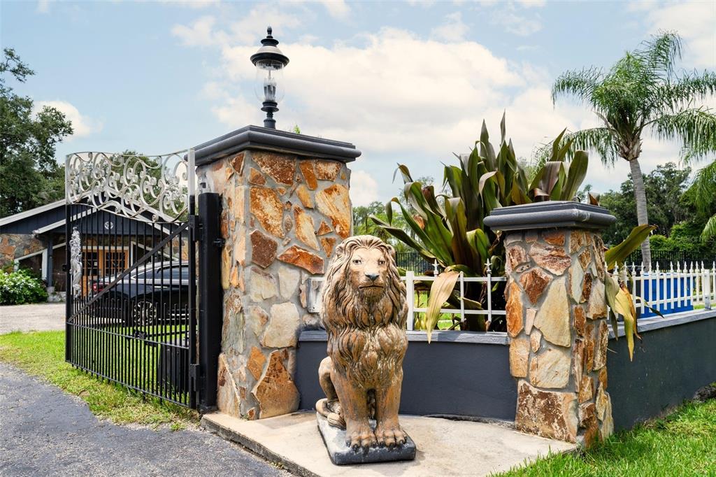 7905 Pierce Harwell Road Plant City, FL 33565 - Photo 59 of 68 a front view of a house with a tree