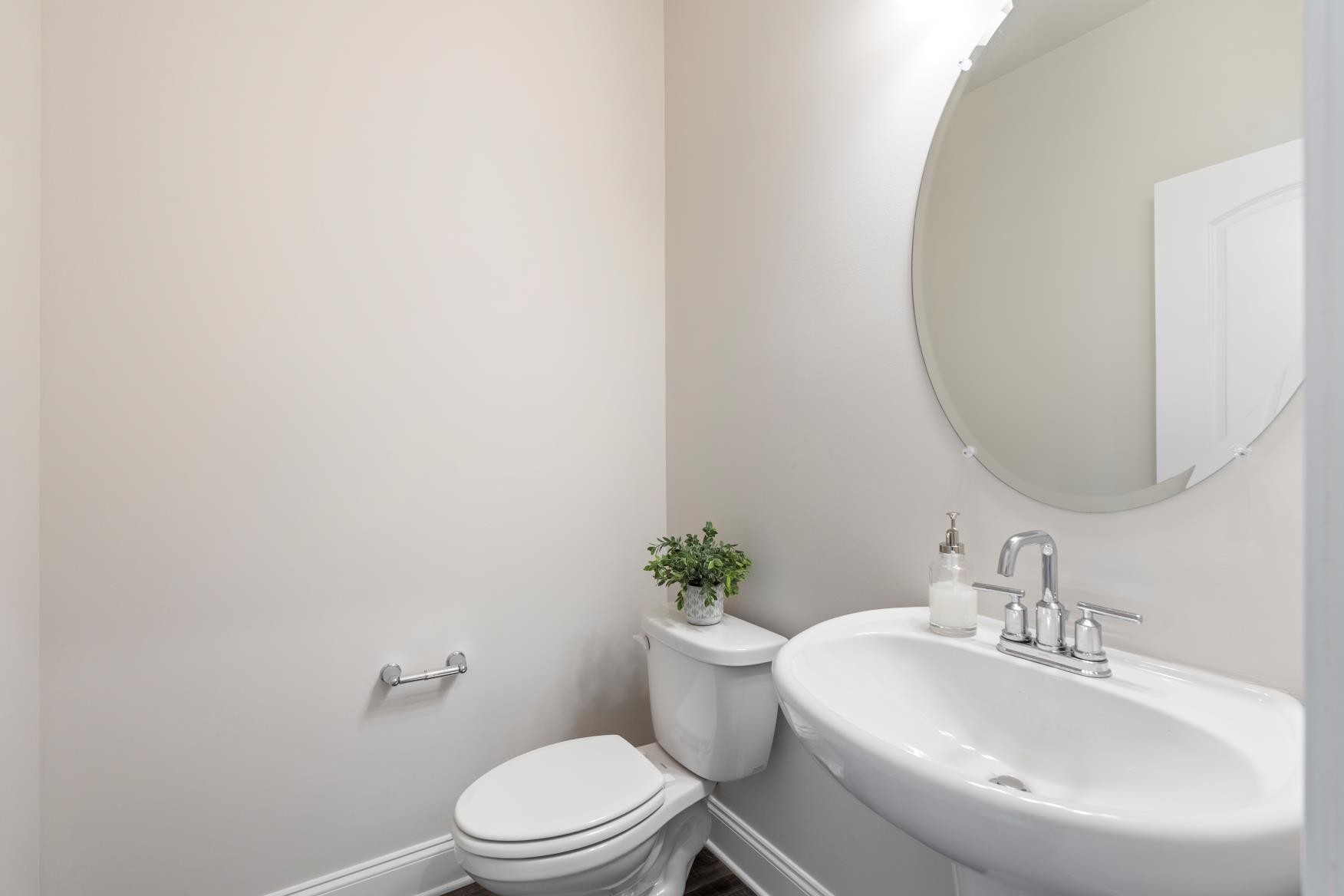 3706 Mathewson Way Murfreesboro, TN 37128 - Photo 24 of 59 a white toilet sitting next to a bathroom sink