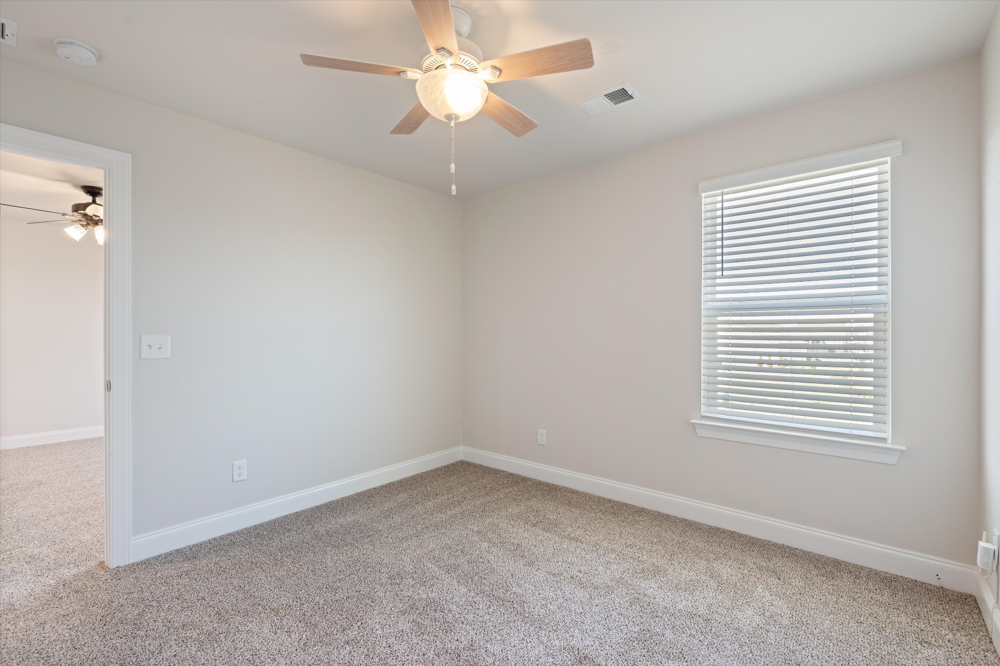 3706 Mathewson Way Murfreesboro, TN 37128 - Photo 42 of 59 an empty room with a window and a fan