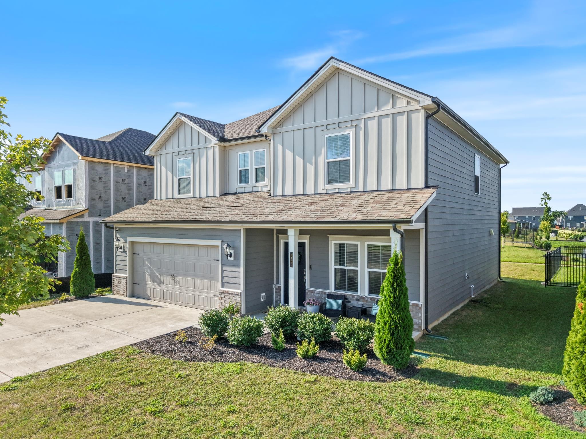 3706 Mathewson Way Murfreesboro, TN 37128 - Photo 5 of 59 a front view of a house with garden