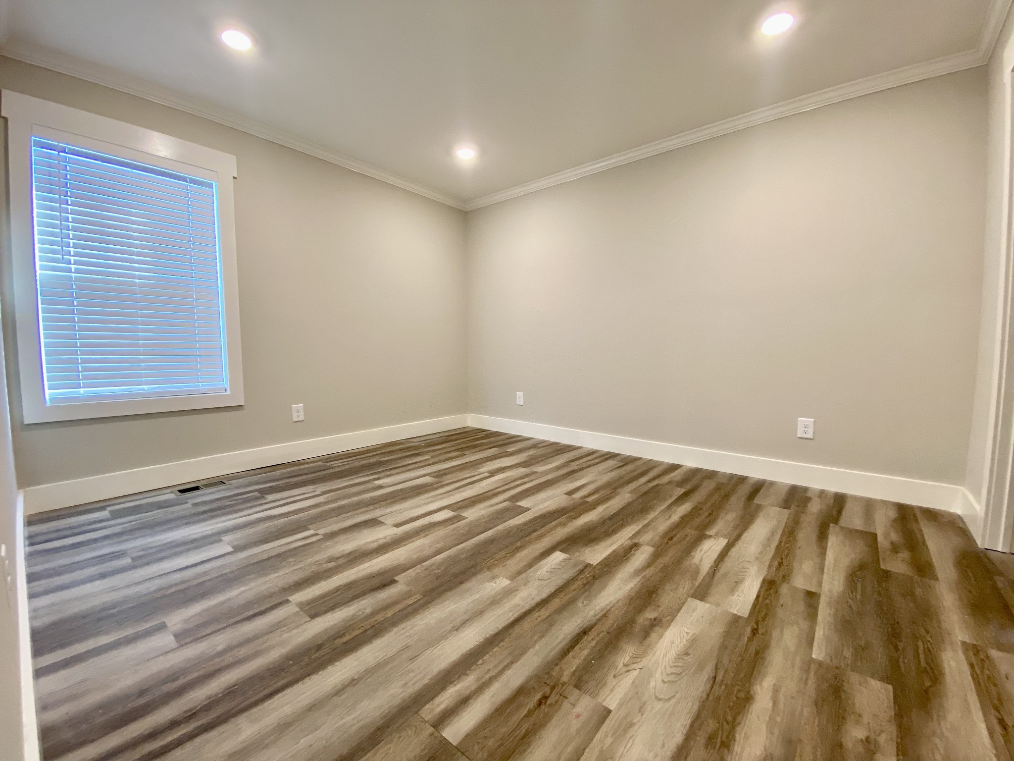 90 Allred Road Decherd, TN 37324 - Photo 13 of 22 a view of a room with wooden floor and fan