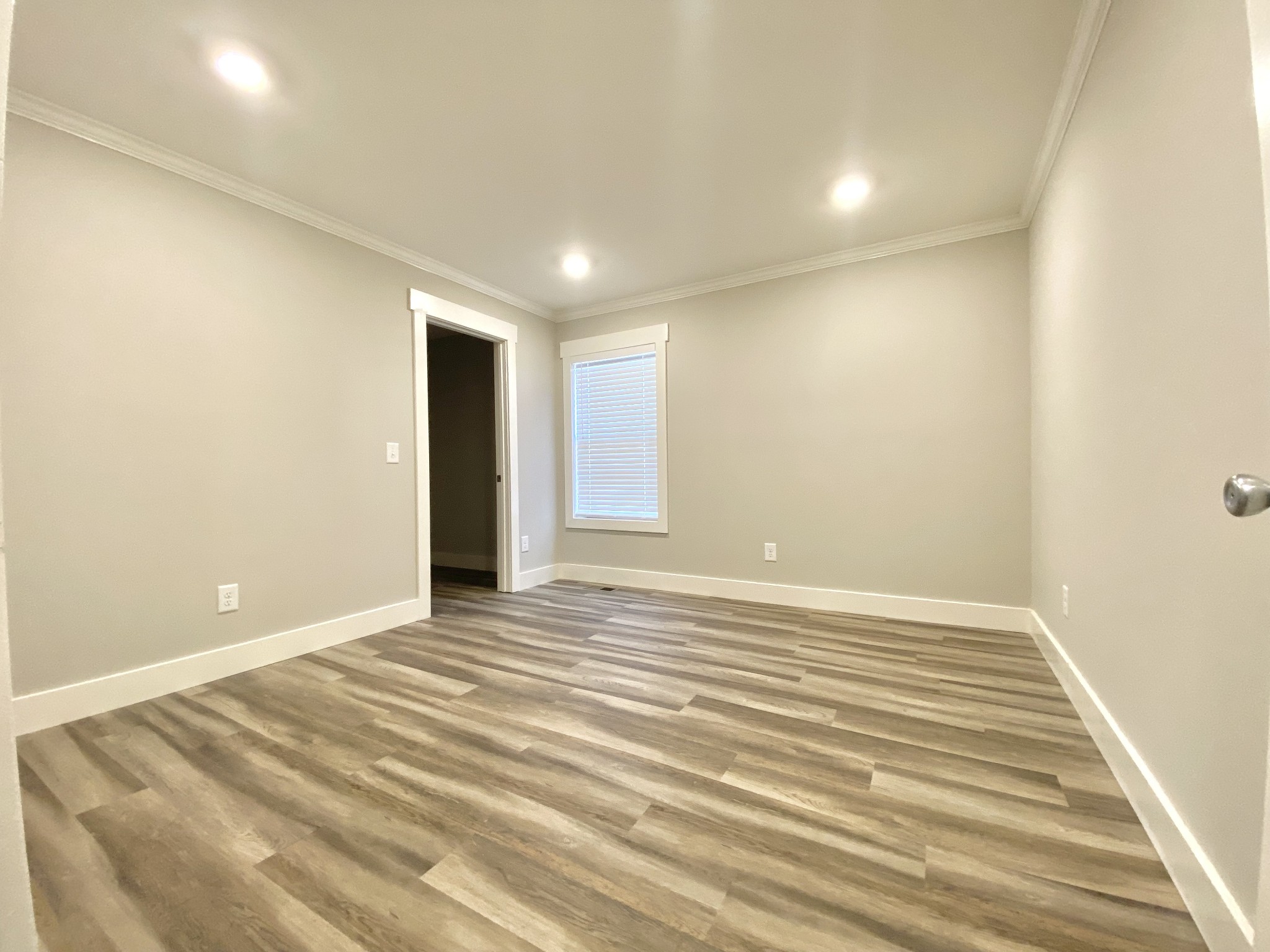 90 Allred Road Decherd, TN 37324 - Photo 17 of 22 a view of an empty room with wooden floor