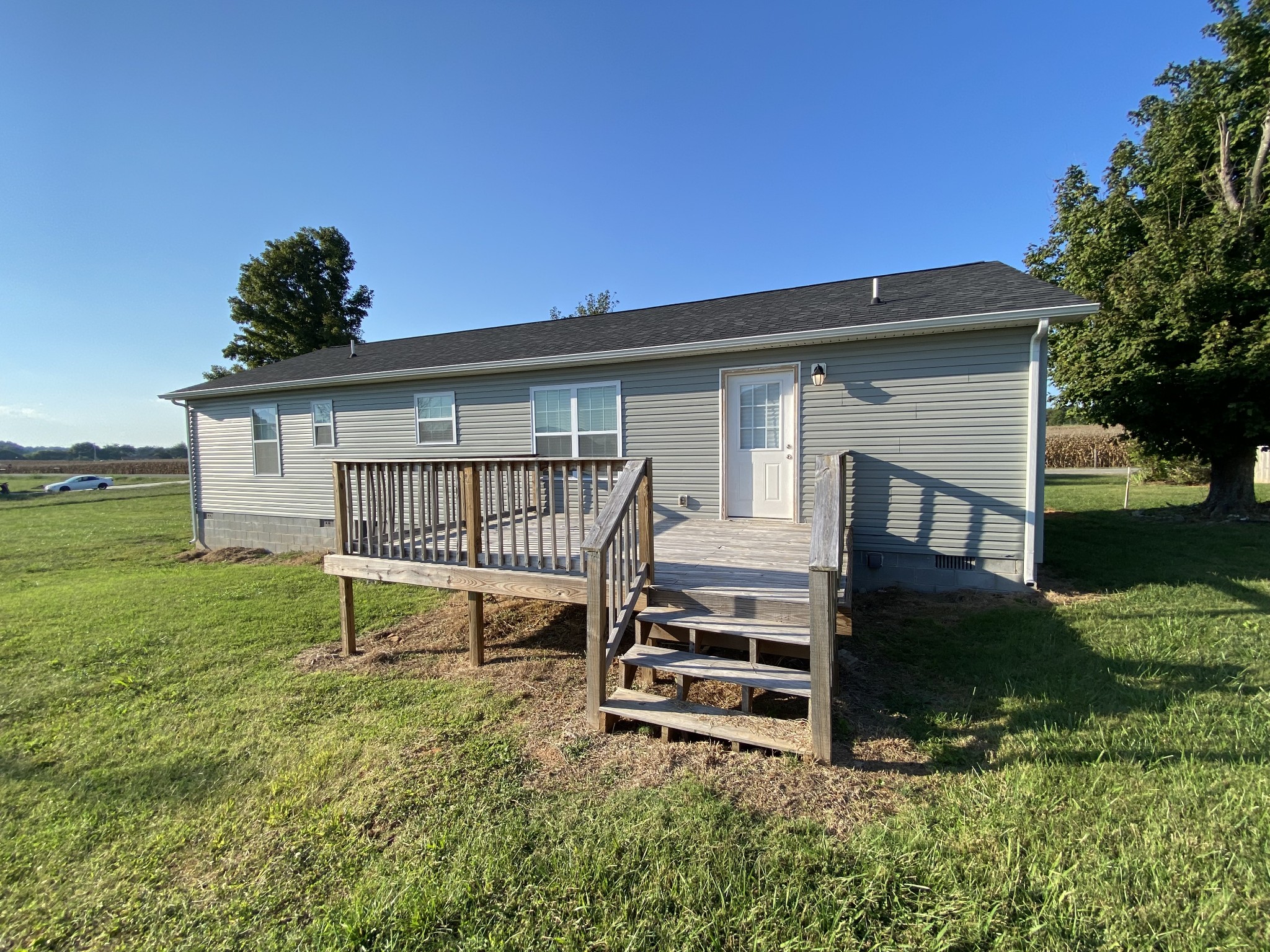 90 Allred Road Decherd, TN 37324 - Photo 3 of 22 a view of a house with a yard and sitting area