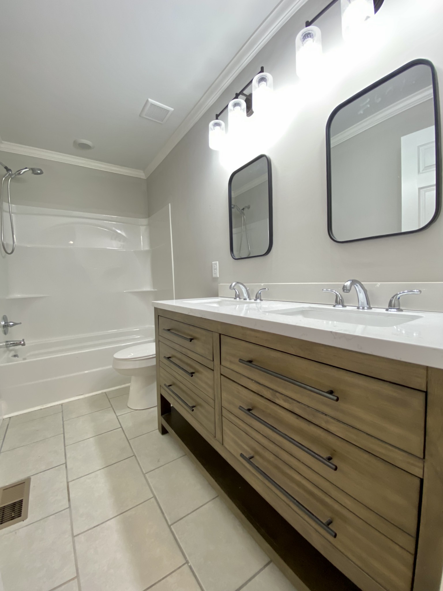 90 Allred Road Decherd, TN 37324 - Photo 8 of 22 a bathroom with a double vanity sink mirror and double