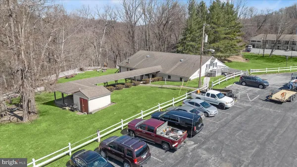 a view of a backyard of the house