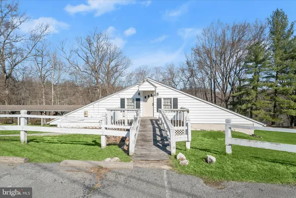 a view of a back yard of the house
