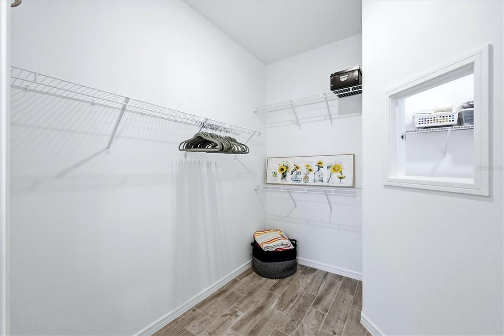 8706 Ocean Tides Cove Parrish, FL 34221 - Photo 23 of 63 a bathroom with a toilet