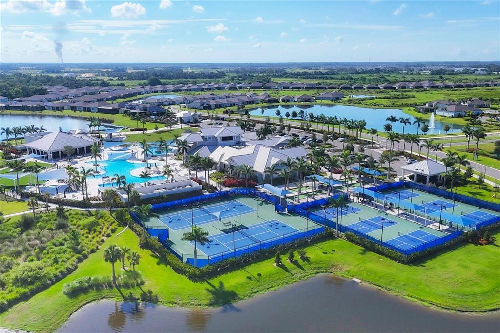 8706 Ocean Tides Cove Parrish, FL 34221 - Photo 63 of 63 an aerial view of a pool patio yard and mountain view in back