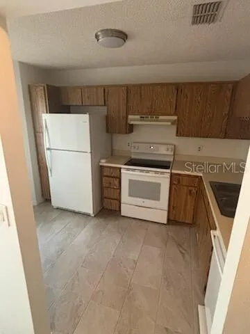 a utility room with washer and dryer