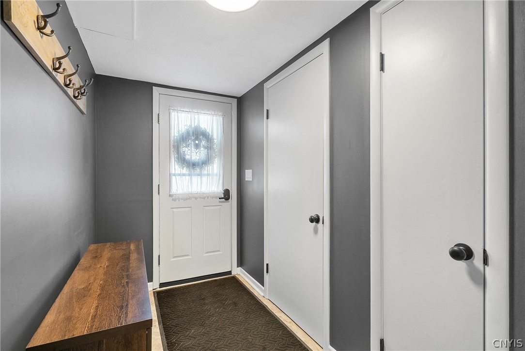 200 Arbordale Road East Camillus, NY 13219 - Photo 3 of 39 Foyer entry with closet and new LVT flooring