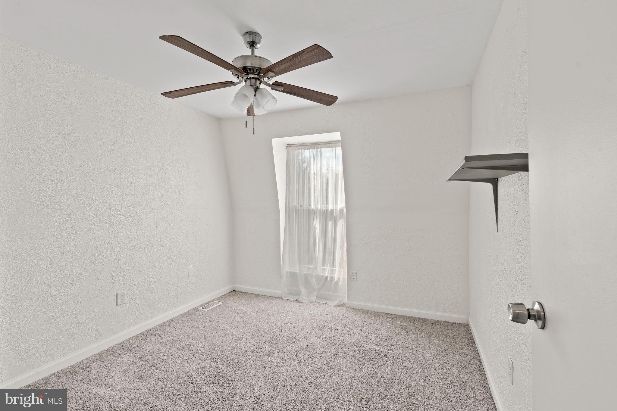 11849B Academy Road, Unit C4 Philadelphia, PA 19154 - Photo 18 of 30 Bright and airy 2nd bedroom with natural light.