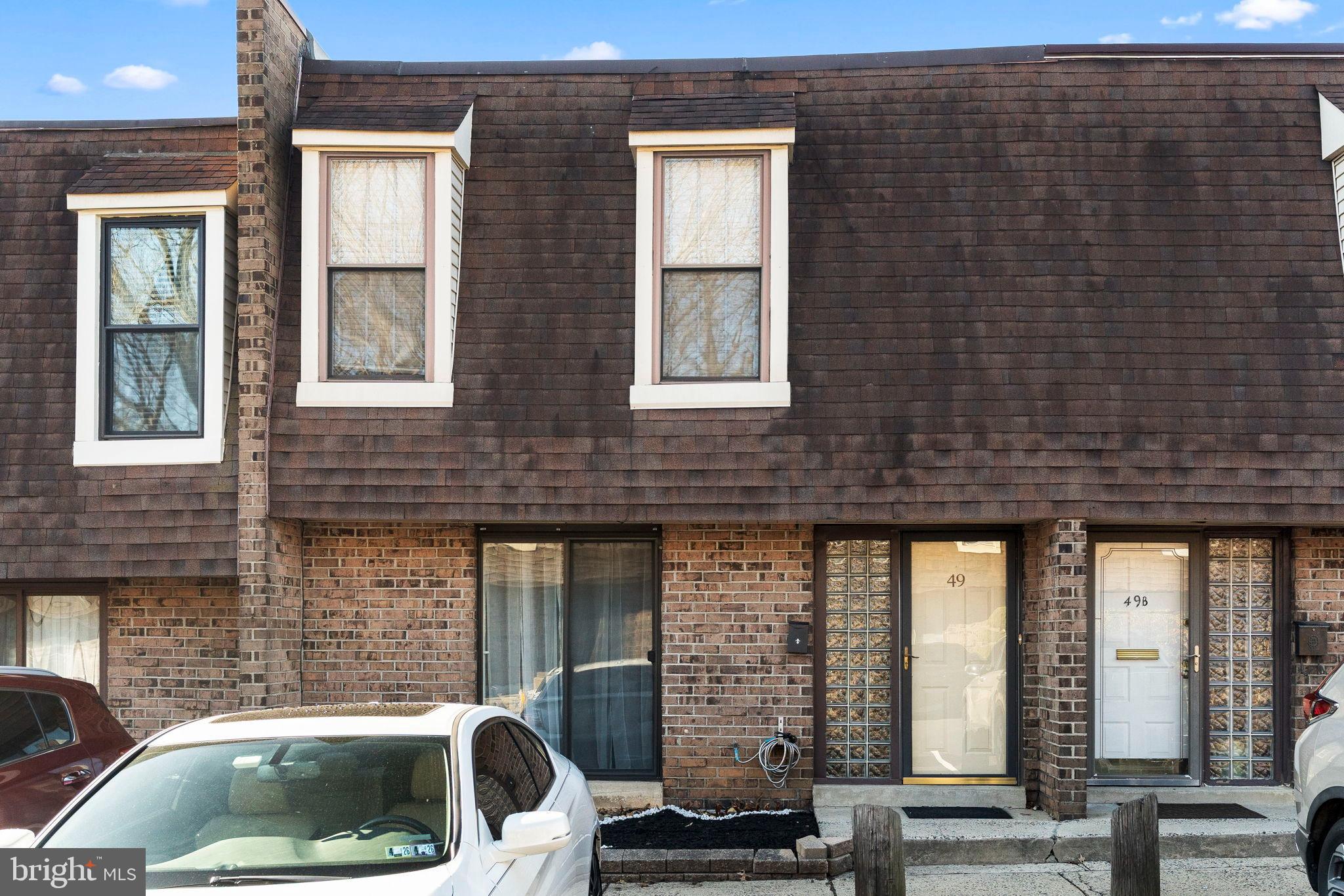 11849B Academy Road, Unit C4 Philadelphia, PA 19154 - Photo 28 of 30 Charming townhouse with classic brick facade.