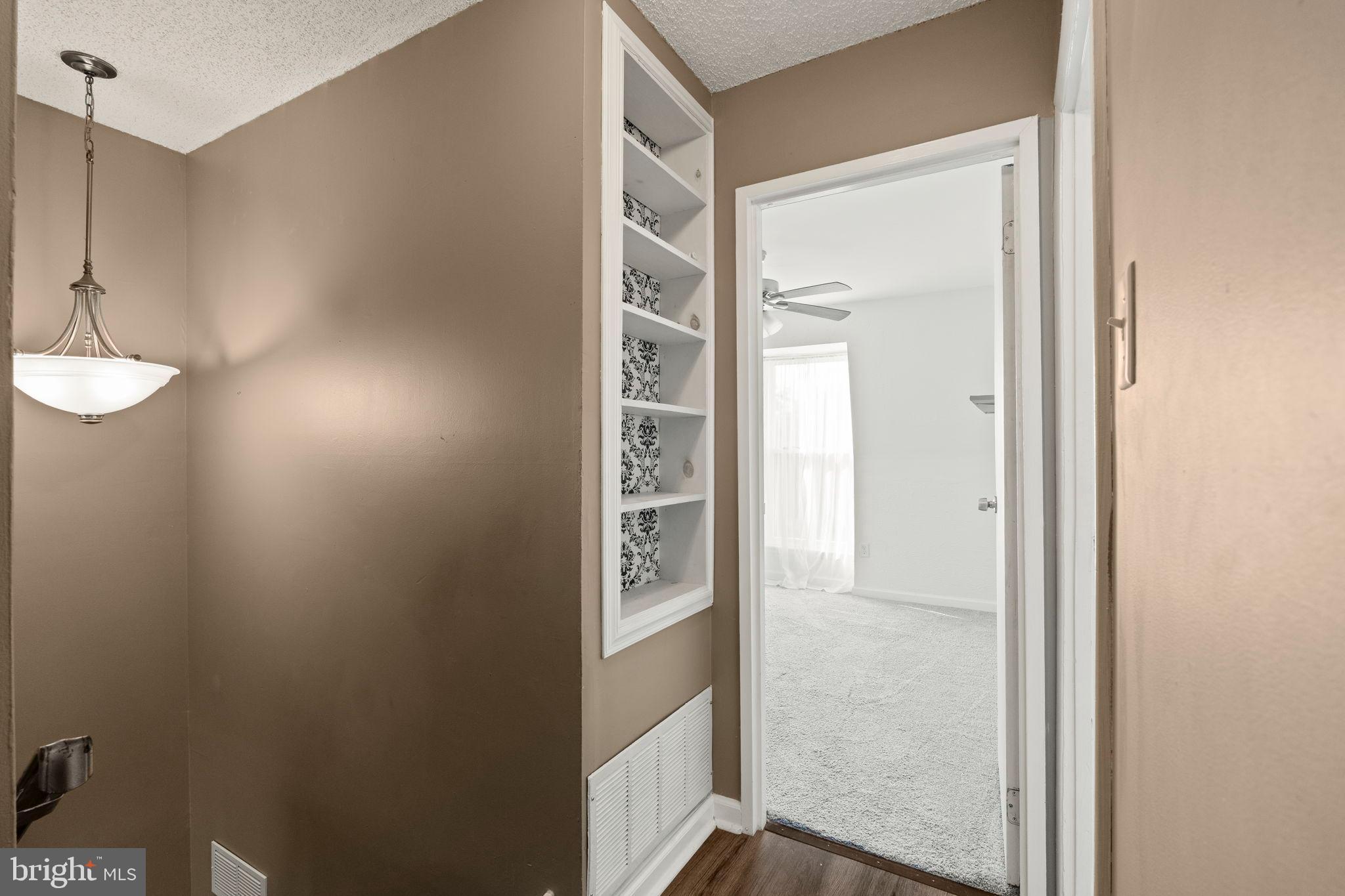 11849B Academy Road, Unit C4 Philadelphia, PA 19154 - Photo 10 of 30 Inviting hallway with built-ins.