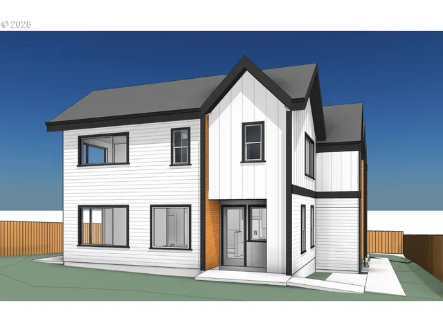 a view of a small house with wooden fence