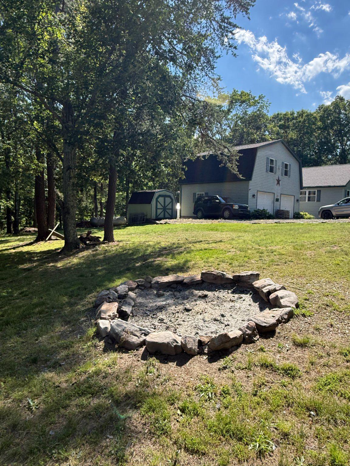 575 North River Highlands Road Delray, WV 26714 - Photo 45 of 48 Embrace the large yard and enjoy the fire pit