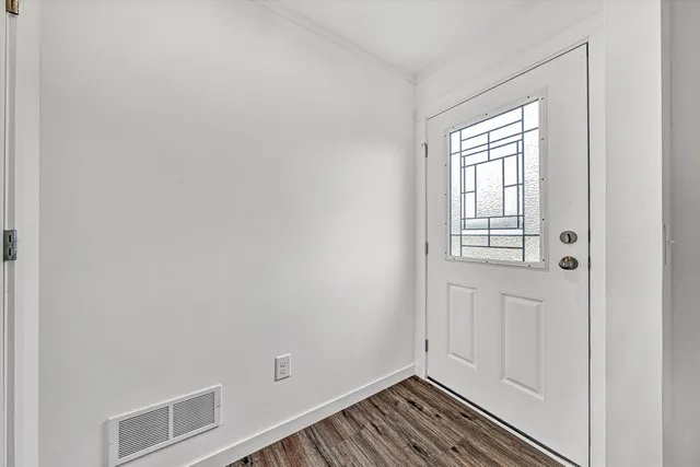 a view of an empty room with window