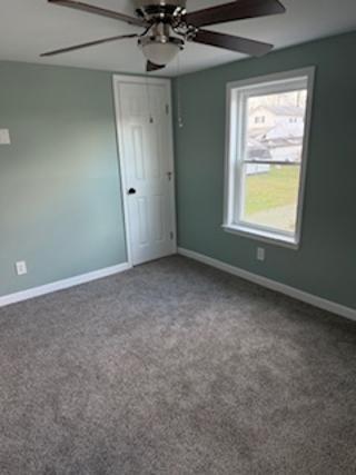 408 3rd Street Allison, PA 15413 - Photo 25 of 40 an empty room with a window and a fan