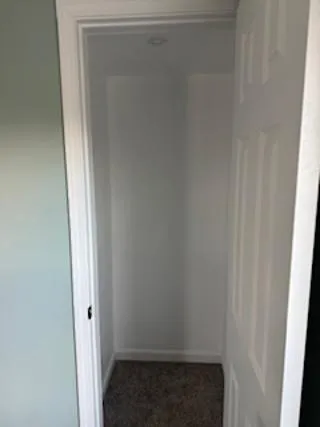 a small space with a hardwood and door