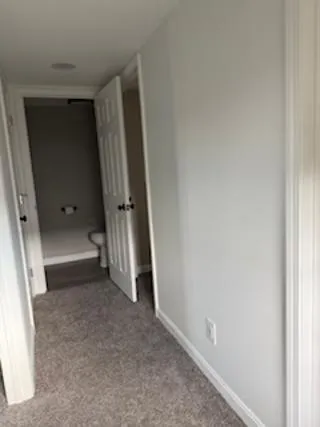 an empty room with a door