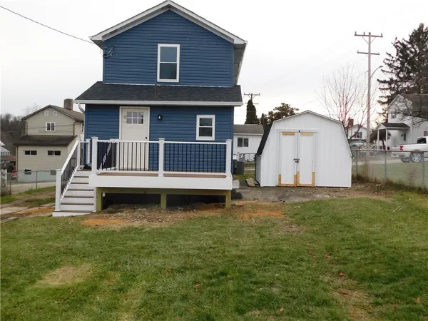a house with a white fence