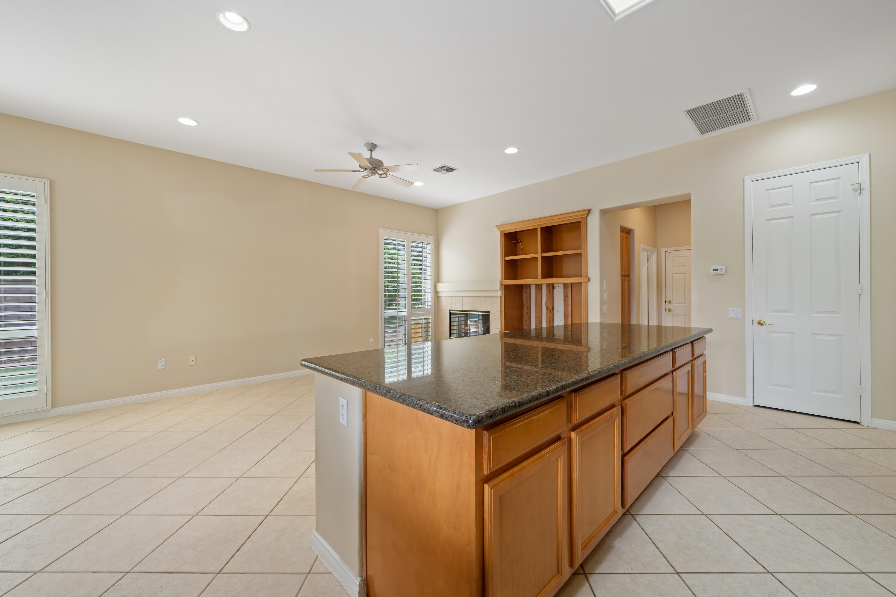 35260 Monarch Way Palm Desert, CA 92211 - Photo 20 of 44 a kitchen with stainless steel appliances granite countertop a sink and a granite counter tops