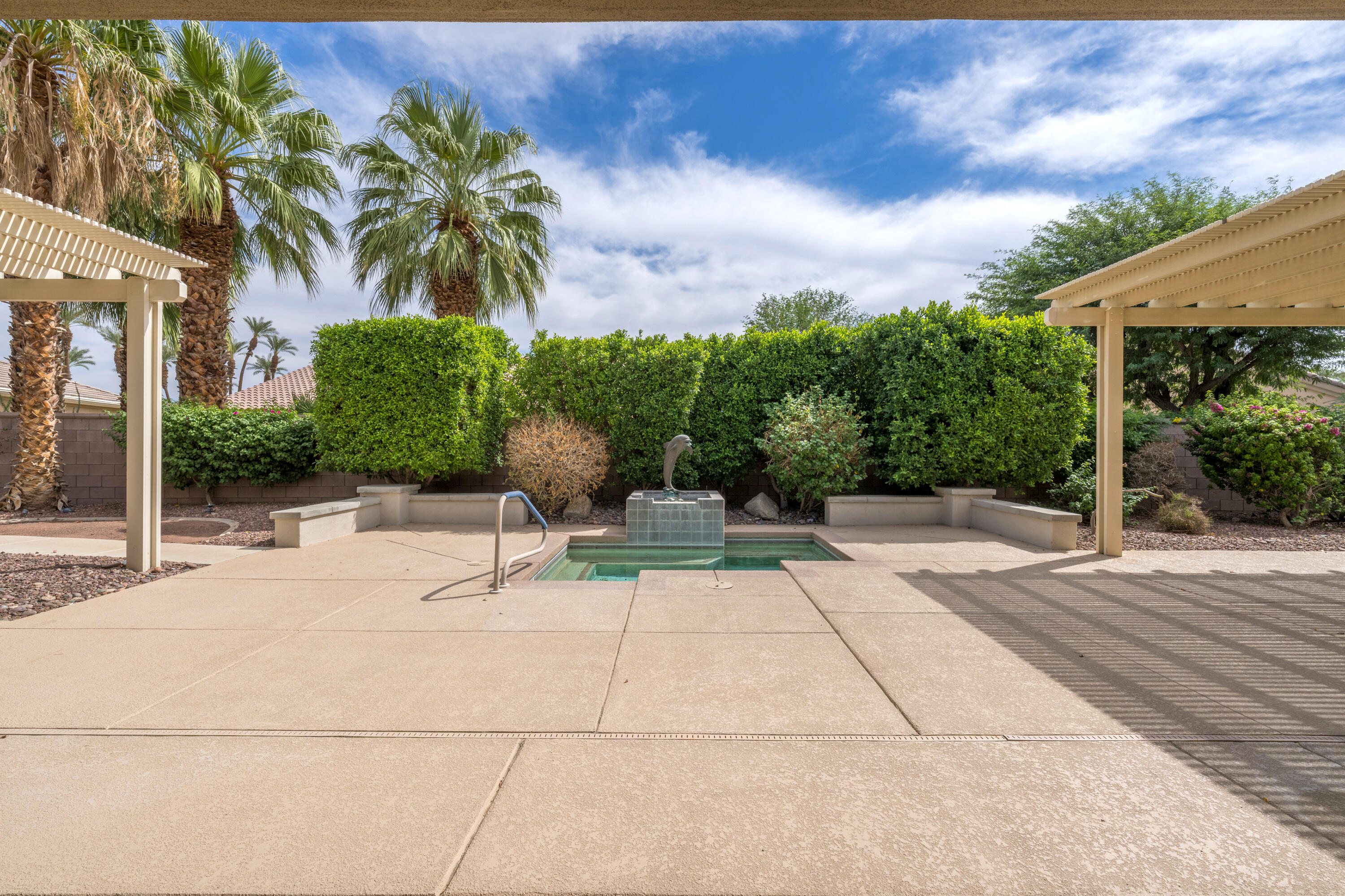 35260 Monarch Way Palm Desert, CA 92211 - Photo 2 of 44 a view of backyard with outdoor seating and plants