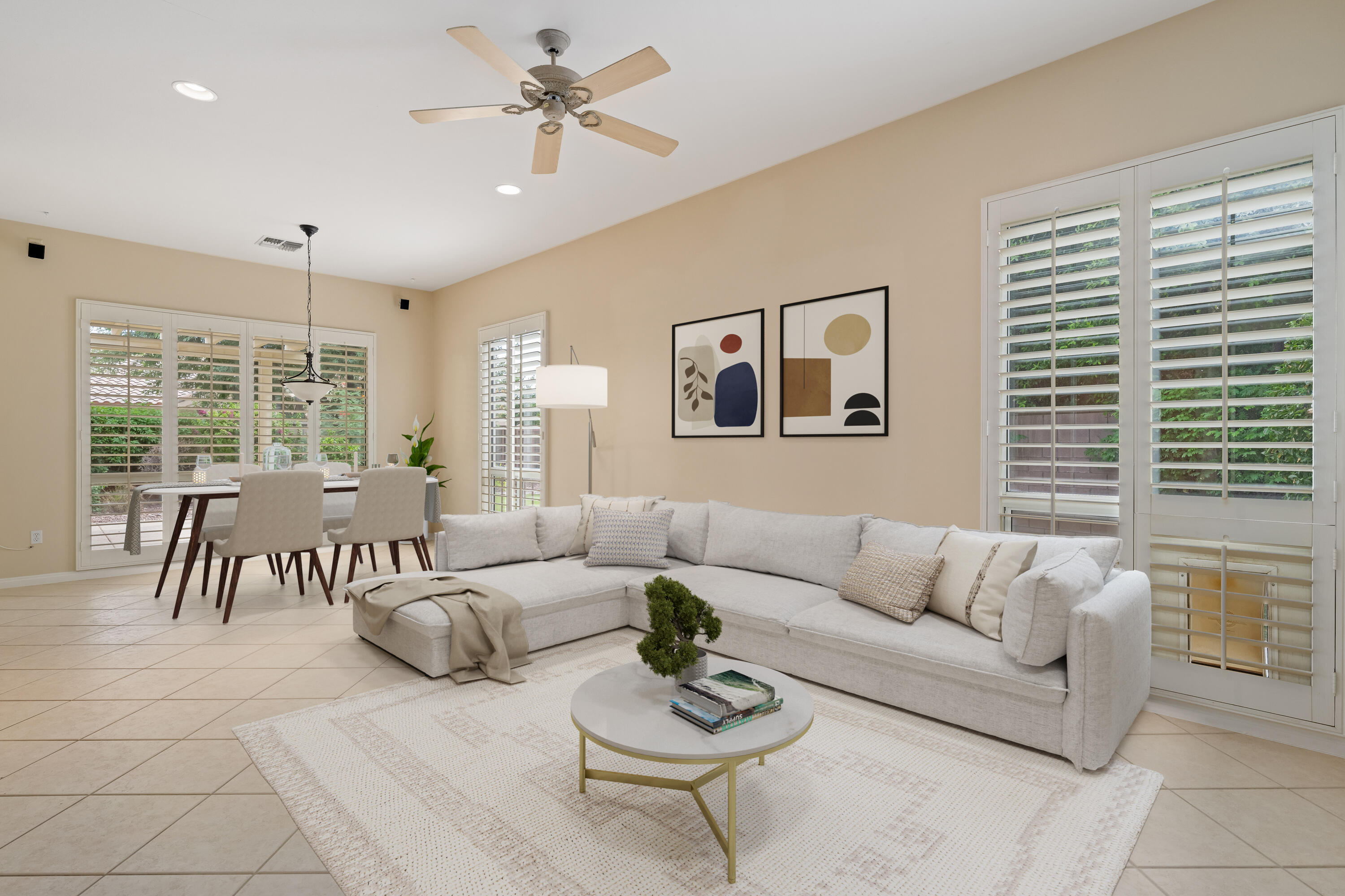 35260 Monarch Way Palm Desert, CA 92211 - Photo 24 of 44 a living room with furniture and large windows