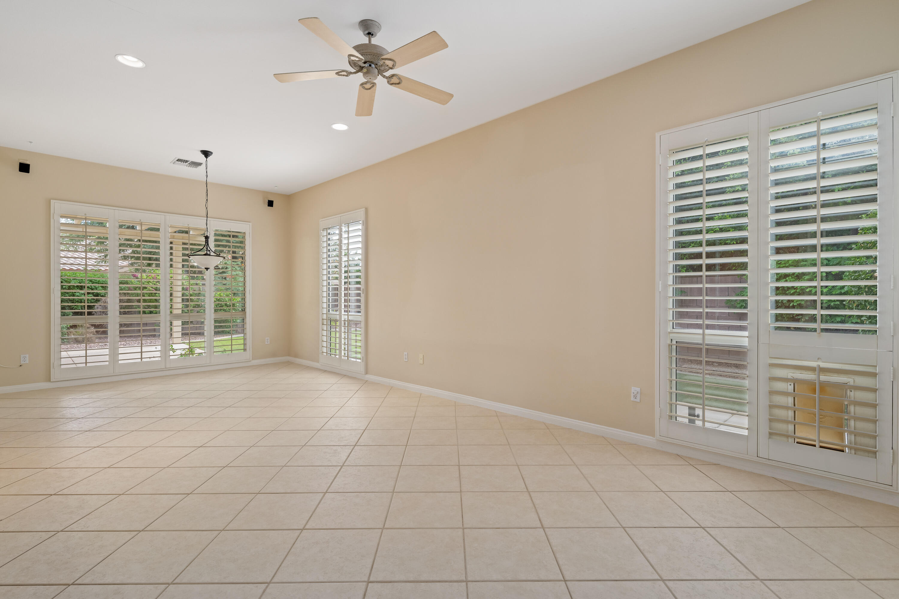 35260 Monarch Way Palm Desert, CA 92211 - Photo 25 of 44 a view of an empty room with a window