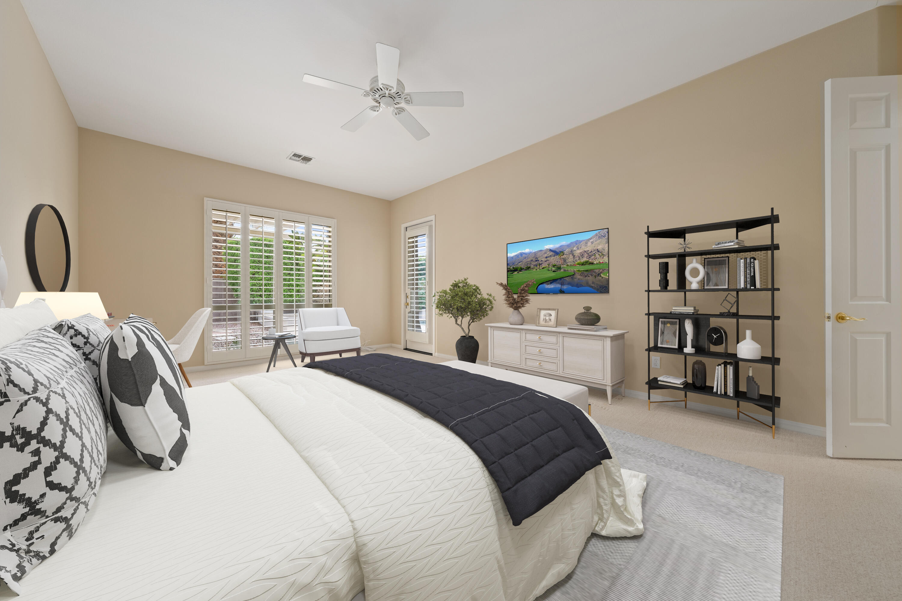 35260 Monarch Way Palm Desert, CA 92211 - Photo 30 of 44 a spacious bedroom with a bed a large window and book shelf