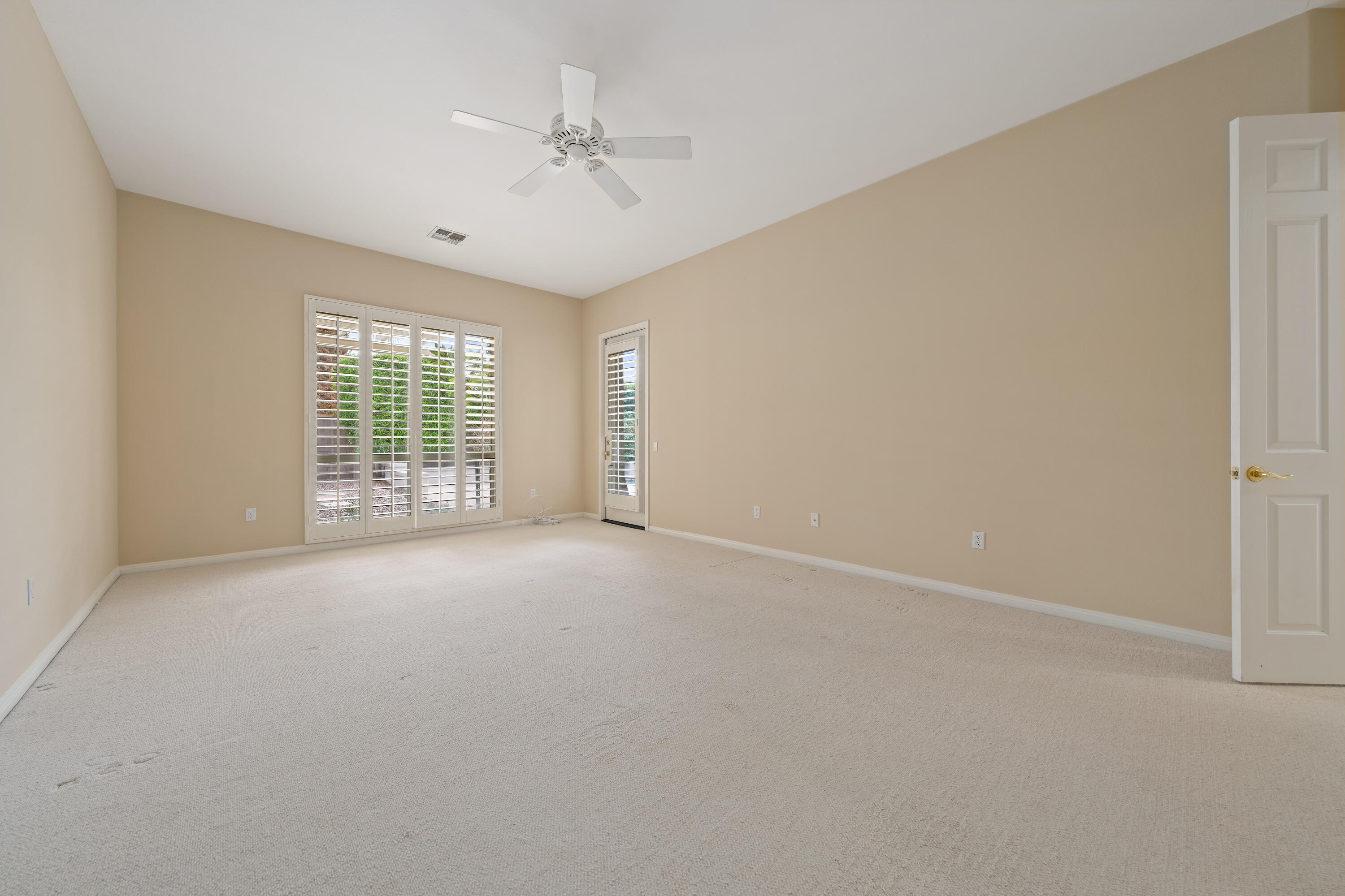 35260 Monarch Way Palm Desert, CA 92211 - Photo 31 of 44 a view of an empty room with a window