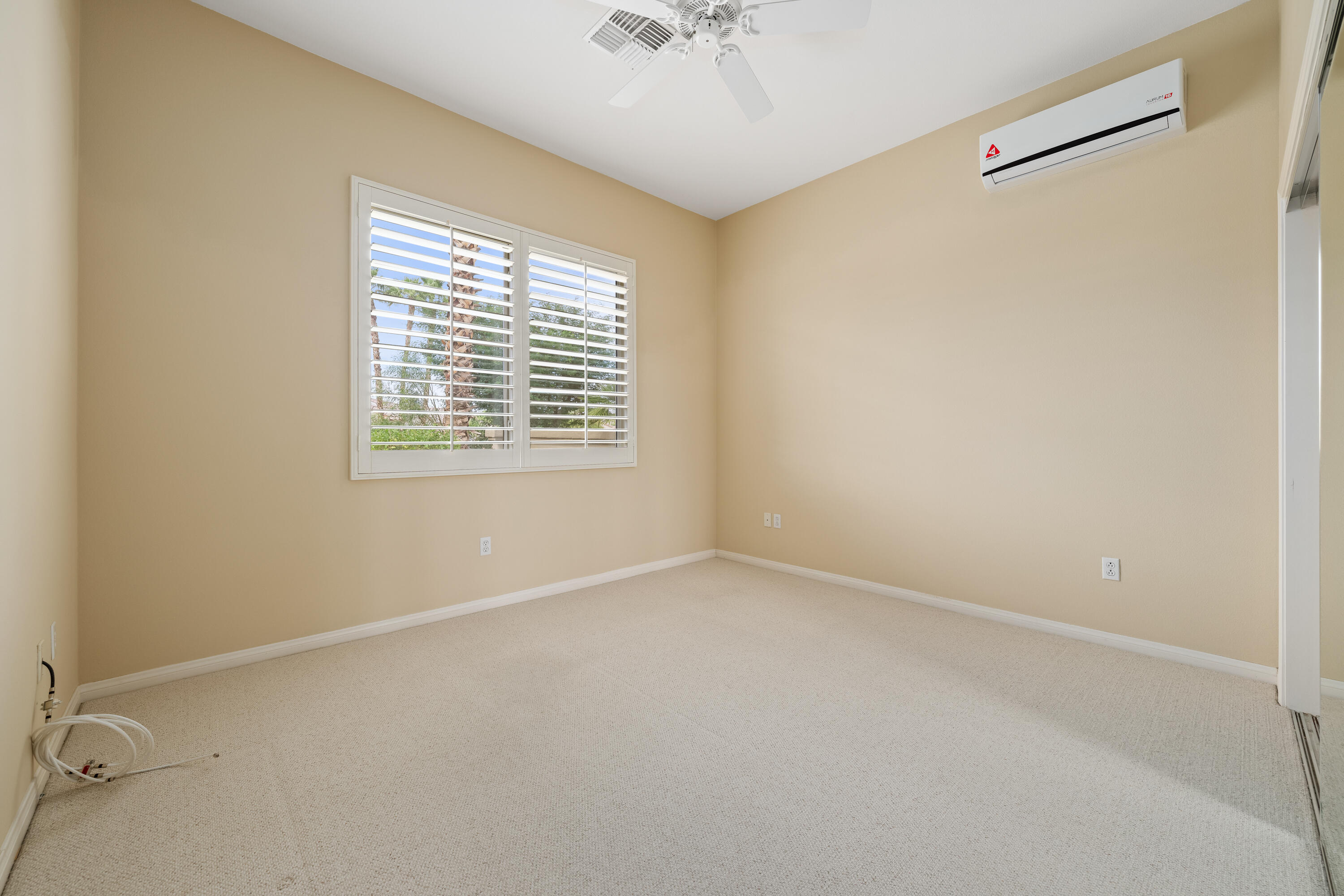 35260 Monarch Way Palm Desert, CA 92211 - Photo 37 of 44 an empty room with a window