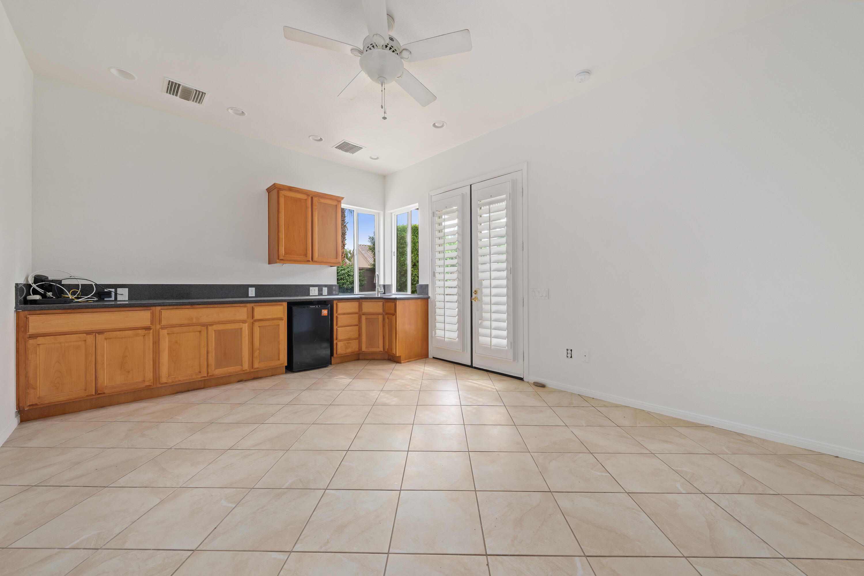 35260 Monarch Way Palm Desert, CA 92211 - Photo 40 of 44 a large kitchen with cabinets and stainless steel appliances