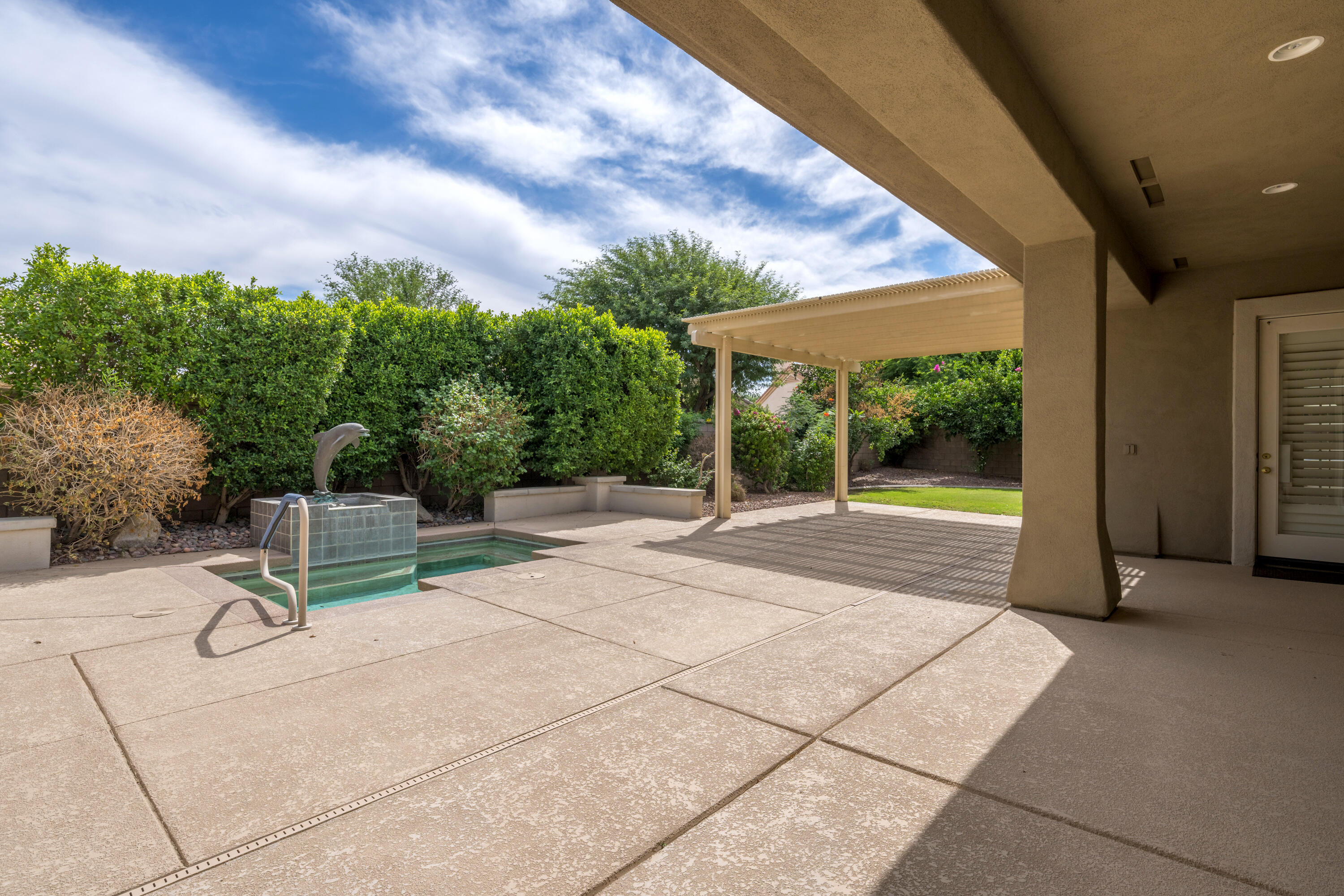 35260 Monarch Way Palm Desert, CA 92211 - Photo 4 of 44 a view of backyard with seating area and green space