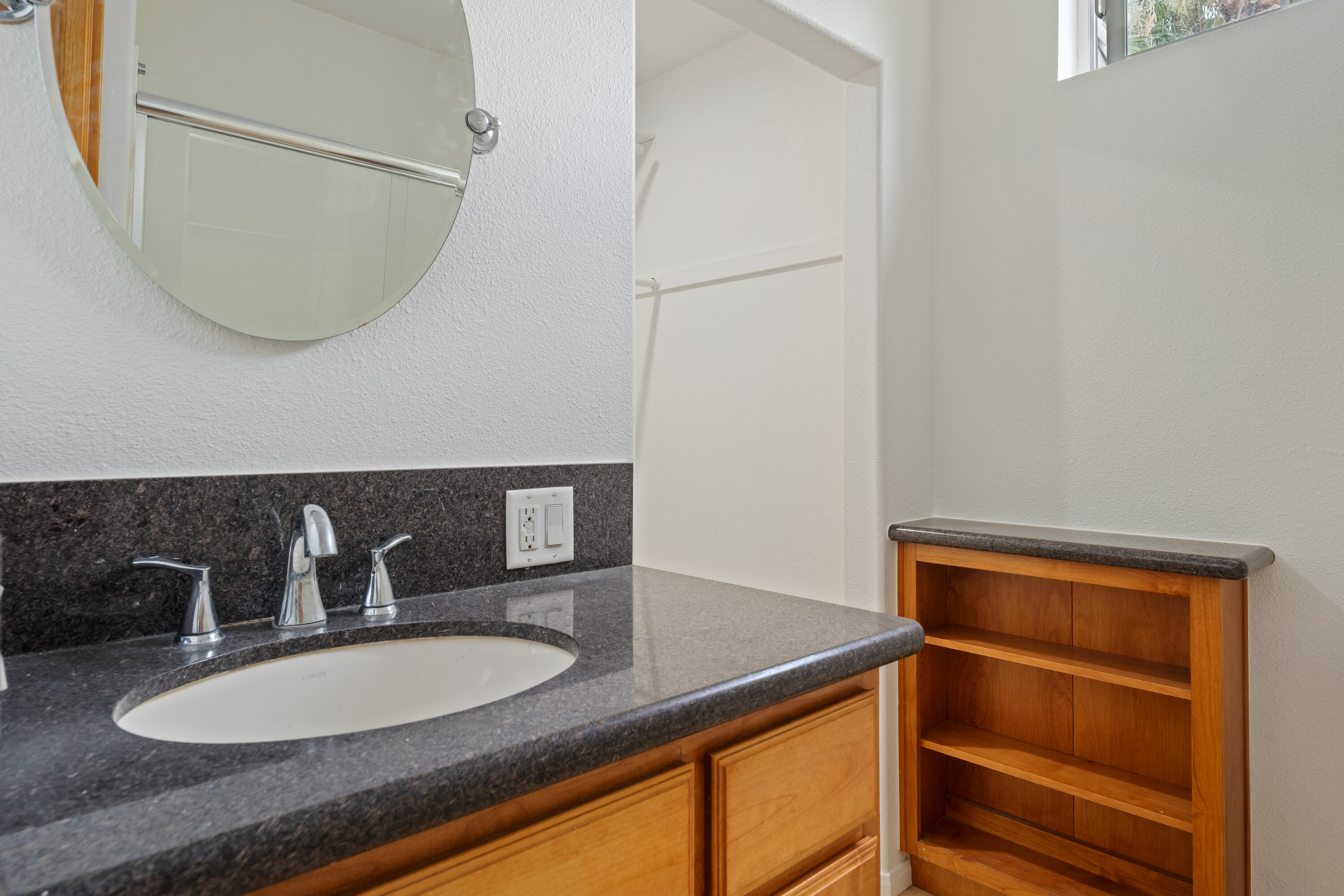 35260 Monarch Way Palm Desert, CA 92211 - Photo 43 of 44 a bathroom with a sink and a mirror