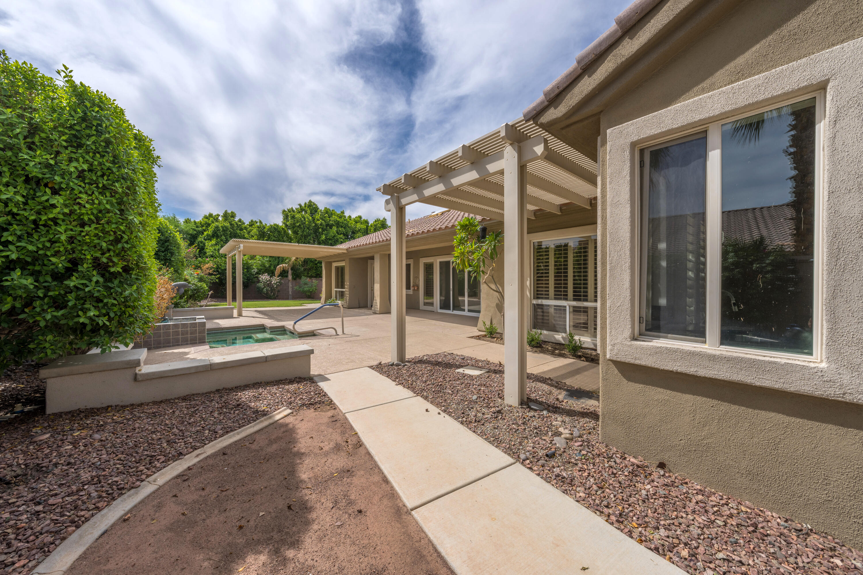 35260 Monarch Way Palm Desert, CA 92211 - Photo 7 of 44 a view of a house with a porch